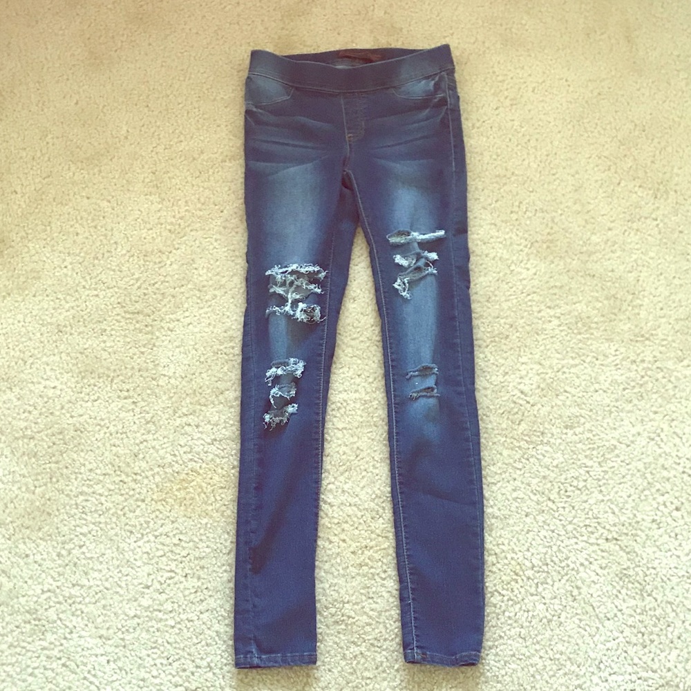 Cut up faded jeggings